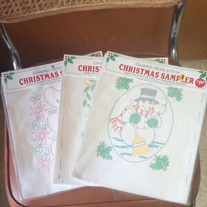 NWT 3 Bucilla Christmas Stamped Cross Stitch Samplers. Snowman Joy Holly Flowers
